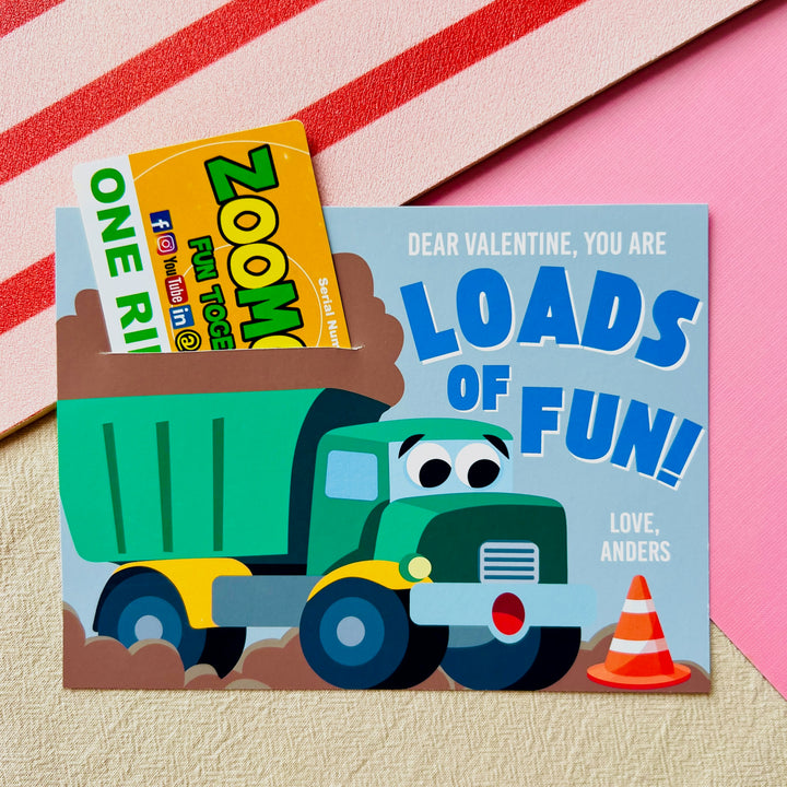 Printable construction truck gift card holder with dump truck design saying "Loads of Fun!" and gift card insert for Valentines classroom exchange