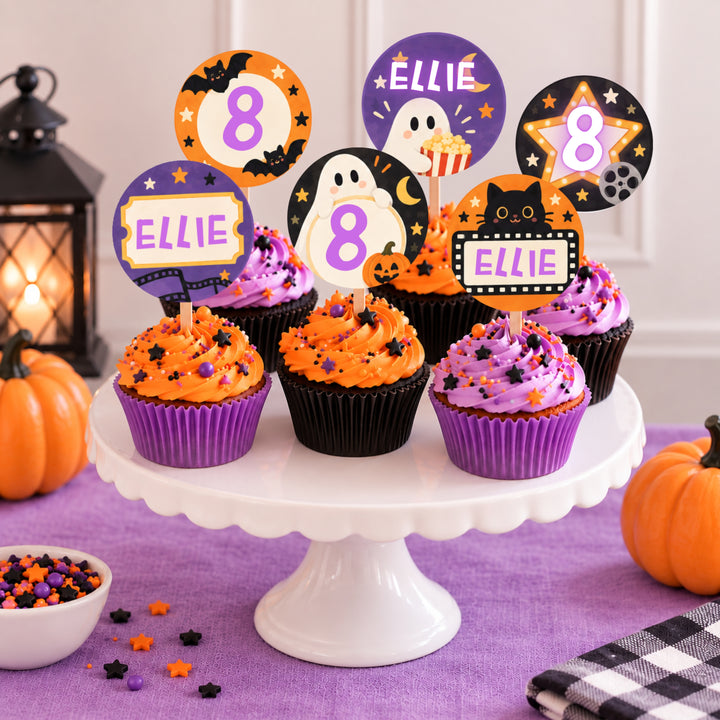 Halloween movie night cupcake toppers with personalized name and age designs on orange and purple cupcakes