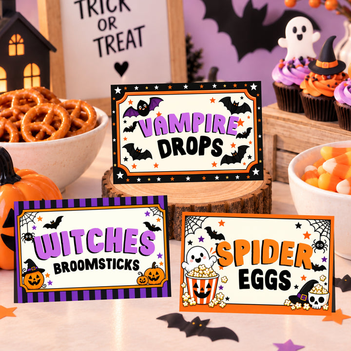 Halloween popcorn bar food tent cards with spooky snack names and colorful designs