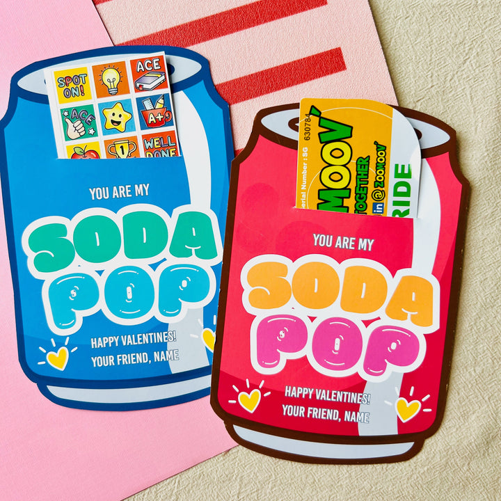 Two colorful 'You Are My Soda Pop' Valentine's Day cards on a pink and red striped background.