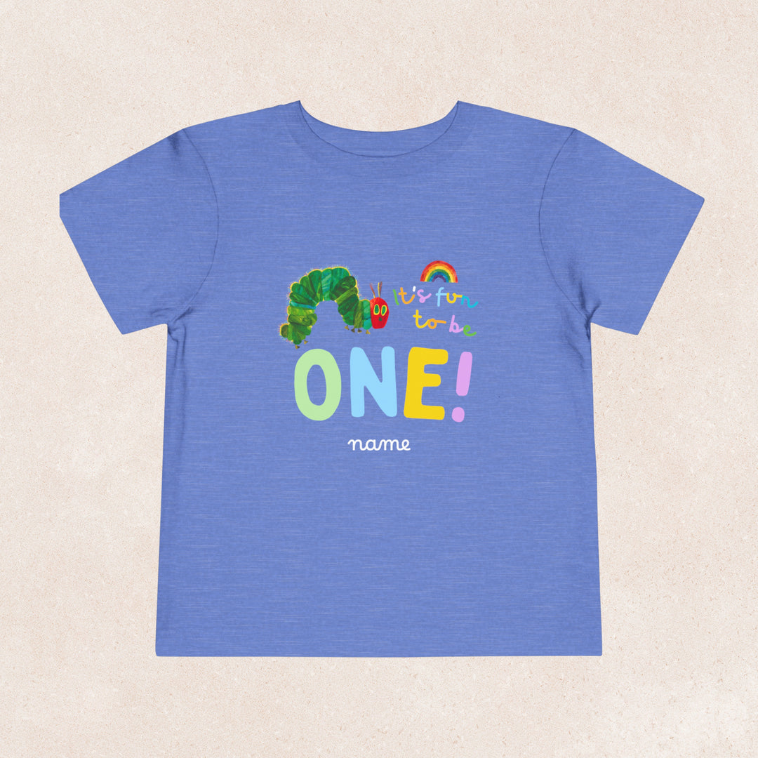 A personalised Very Hungry Caterpillar birthday shirt in blue featuring texts &