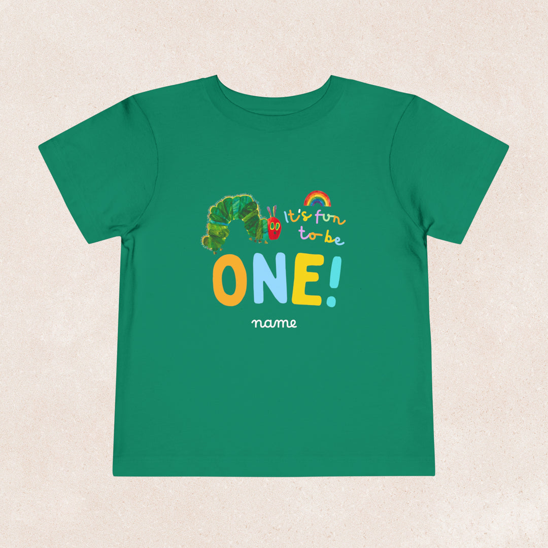 A personalised Very Hungry Caterpillar birthday shirt in green featuring texts &