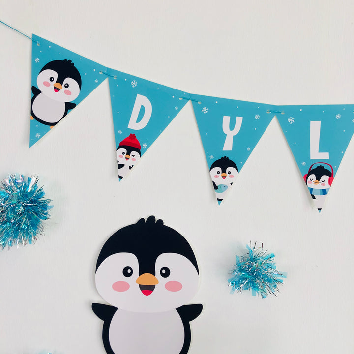 Penguin banner with letters spelling out name