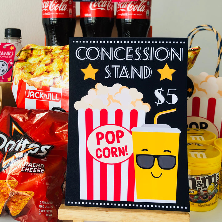 Movie night concession stand sign with popcorn and drinks