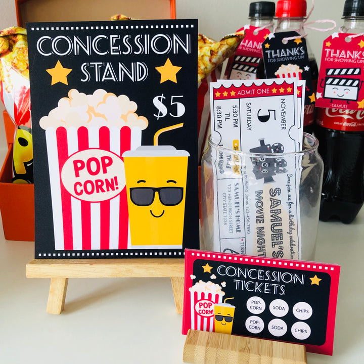 Concession stand sign with tickets and snacks setup