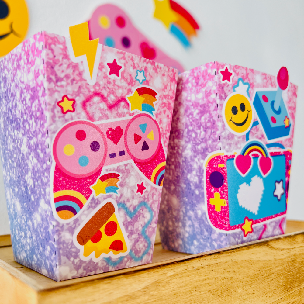 Printable pink gamer girl favor boxes mockup assembled with treats for kids birthday party